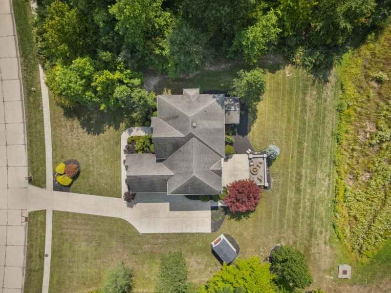 House survey showing an aerial view of a home and open yard for planning an addition near a septic drain field in Bryan Texas.